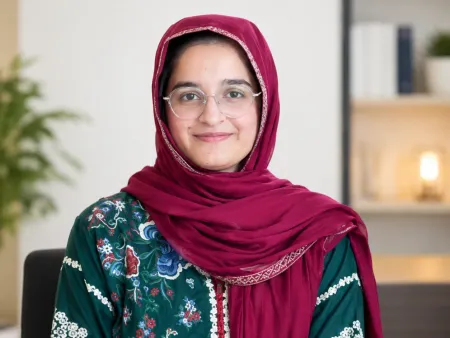 Clinical Psychologist Rabbia Ashraf holding child consultation